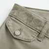 Pantalon évasé à taille ultra basse et broderies Pantalon évasé à taille ultra basse et broderies
