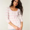 Pull babydoll en maille torsadée Pull babydoll en maille torsadée