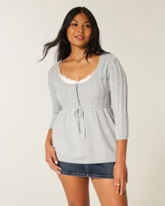 Pull babydoll en maille torsadée