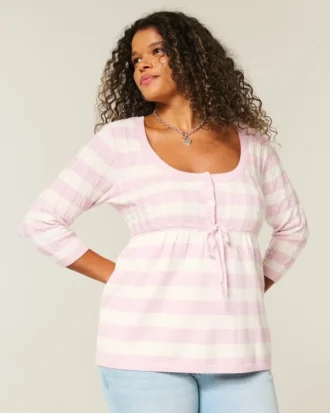 Pull babydoll en maille torsadée