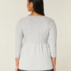 Pull babydoll en maille torsadée Pull babydoll en maille torsadée
