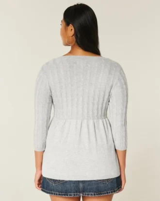 Pull babydoll en maille torsadée
