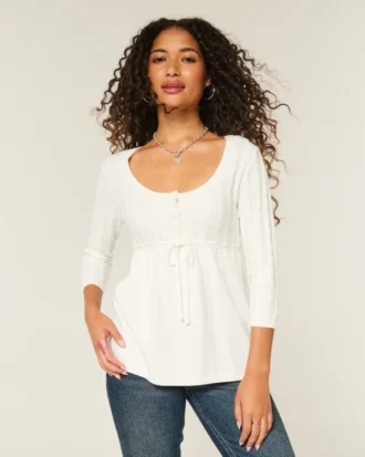 Pull babydoll en maille torsadée Pull babydoll en maille torsadée