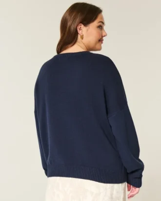 Pull à col rond avec motif poisson sautant