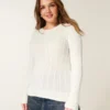 Pull à col rond emblématique en maille torsadée