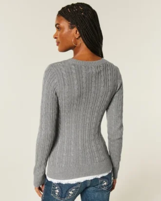 Pull à col rond emblématique en maille torsadée