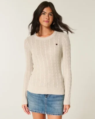 Pull à col rond et motif cœur en maille torsadée