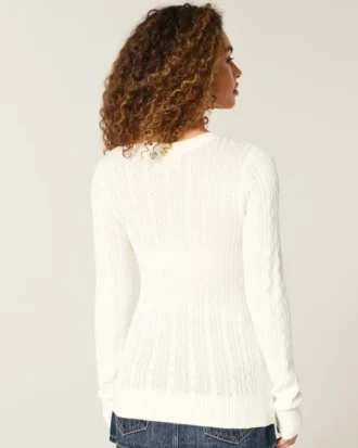 Pull à col rond et motif étoilé en maille torsadée