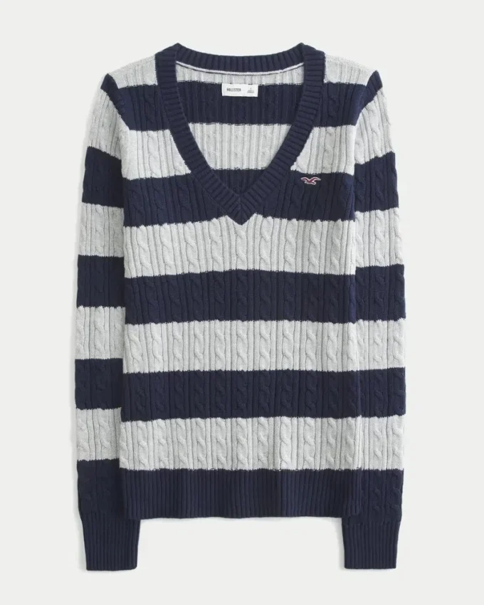 Pull iconique à col en V et torsades