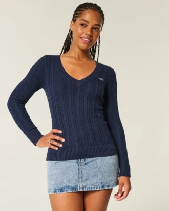 Pull iconique à col en V et torsades