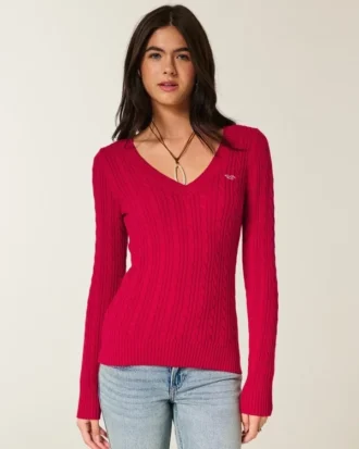 Pull iconique à col en V et torsades
