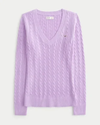 Pull iconique à col en V et torsades