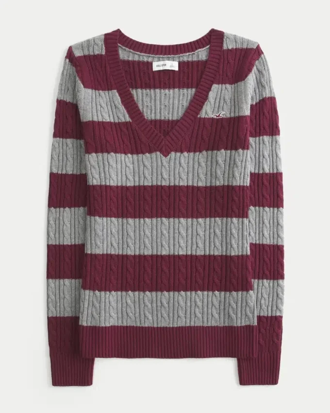 Pull iconique à col en V et torsades