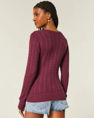Pull iconique à col en V et torsades