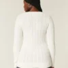Pull iconique à col en V et torsades