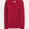 Pull iconique à col en V et torsades