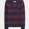 Pull iconique à col en V et torsades