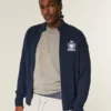 Pull zippé décontracté avec emblème Pull zippé décontracté avec emblème