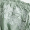 Robe babydoll brodée sans bretelles Robe babydoll brodée sans bretelles