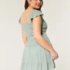 Robe jupe-short à manches flottantes Robe jupe-short à manches flottantes