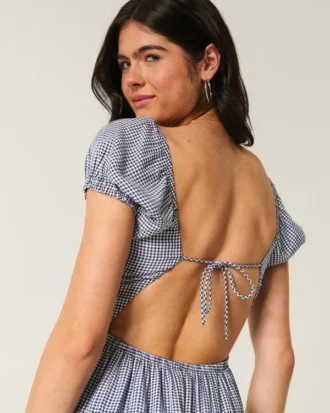 Robe longue à manches courtes et dos nu
