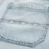 Short baggy en denim avec broderie en chaîne Short baggy en denim avec broderie en chaîne