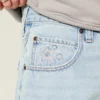 Short baggy en denim à motif graphique étoilé Short baggy en denim à motif graphique étoilé