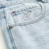 Short baggy en denim à motif graphique étoilé Short baggy en denim à motif graphique étoilé