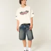 Short baggy en denim à motif serpent Short baggy en denim à motif serpent