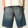 Short baggy en denim à motif serpent Short baggy en denim à motif serpent