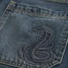 Short baggy en denim à motif serpent Short baggy en denim à motif serpent