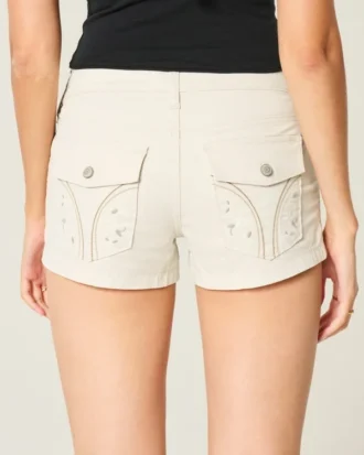 Short court taille basse à poche arrière fleurie en popeline