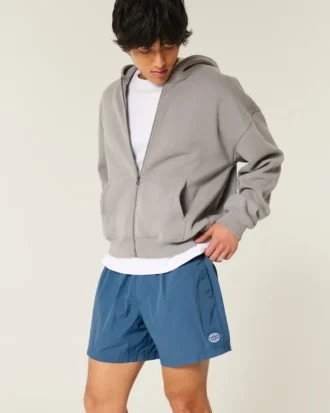 Short de football ample mi-cuisse