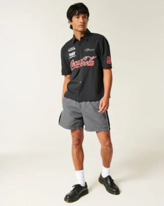 Short de football ample mi-cuisse