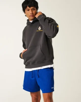 Short de football en tricot avec logo, longueur mi-cuisse
