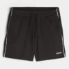 Short de football en tricot avec logo, longueur mi-cuisse