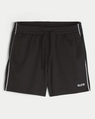 Short de football en tricot avec logo, longueur mi-cuisse