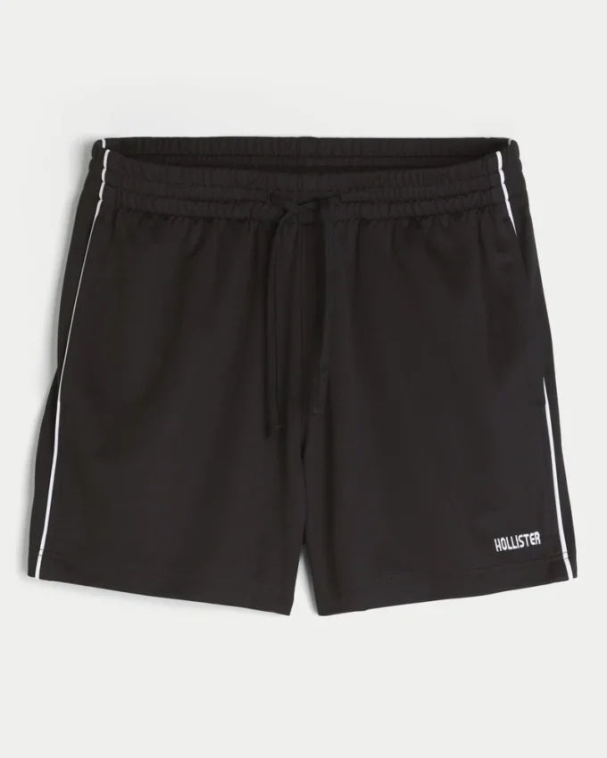 Short de football en tricot avec logo, longueur mi-cuisse