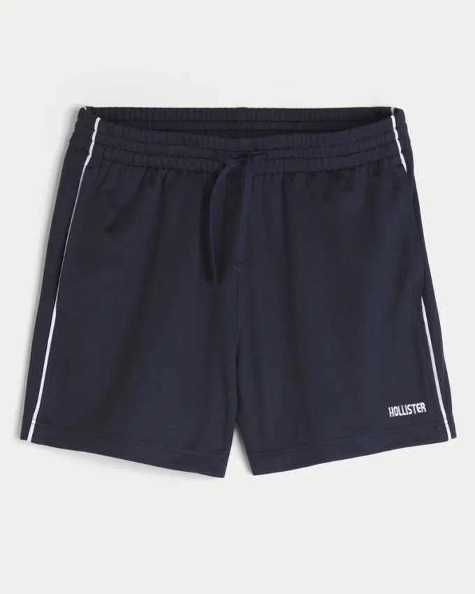 Short de football en tricot avec logo, longueur mi-cuisse
