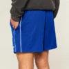 Short de football en tricot avec logo, longueur mi-cuisse