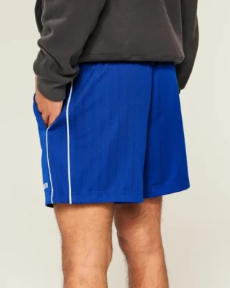 Short de football en tricot avec logo, longueur mi-cuisse