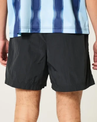 Short de football mi-cuisse