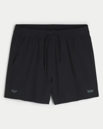 Short de sport avec logo mi-cuisse