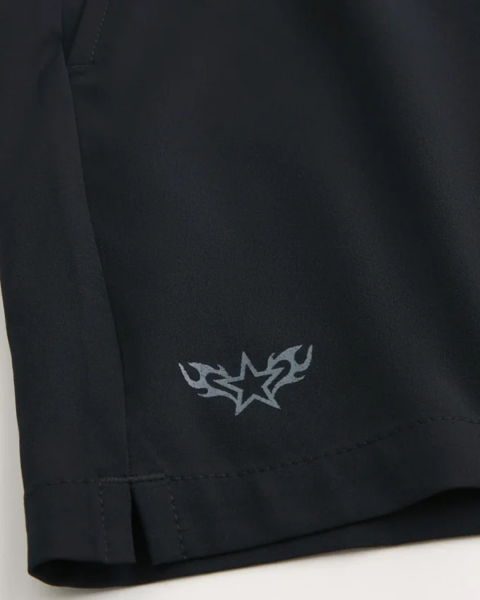Short de sport avec logo mi-cuisse Short de sport avec logo mi-cuisse