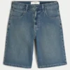 Short en denim super baggy délavé foncé, longueur sous le genou
