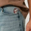 Short en denim super baggy Taz Graphic Medium Wash Short en denim super baggy Taz Graphic Medium Wash