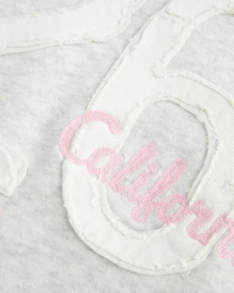 Sweat à capuche graphique doublé de fausse fourrure
