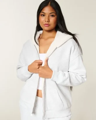 Sweat à capuche réversible en polaire doublé de fausse fourrure