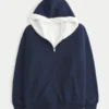 Sweat à capuche réversible en polaire doublé de fausse fourrure Sweat à capuche réversible en polaire doublé de fausse fourrure