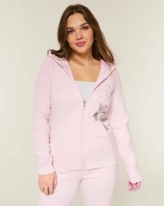 Sweat à capuche zippé avec motif rose